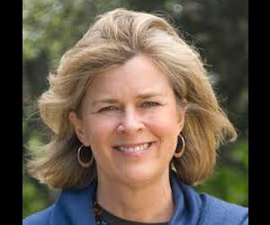 Headshot of Susie Brusa, smiling